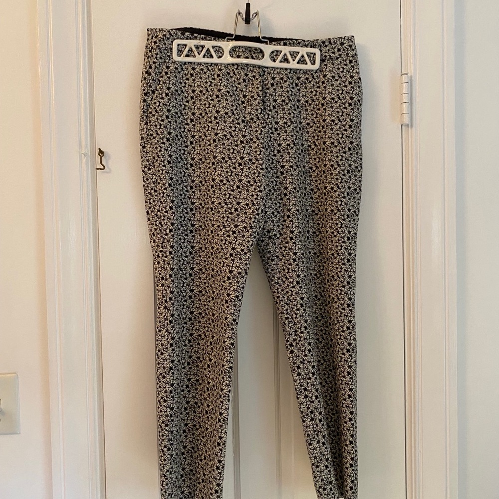 Miss Selfridge white pants with black floral print. US Size 8.